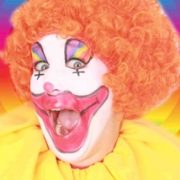 Pruik Clown Oranje Krullen